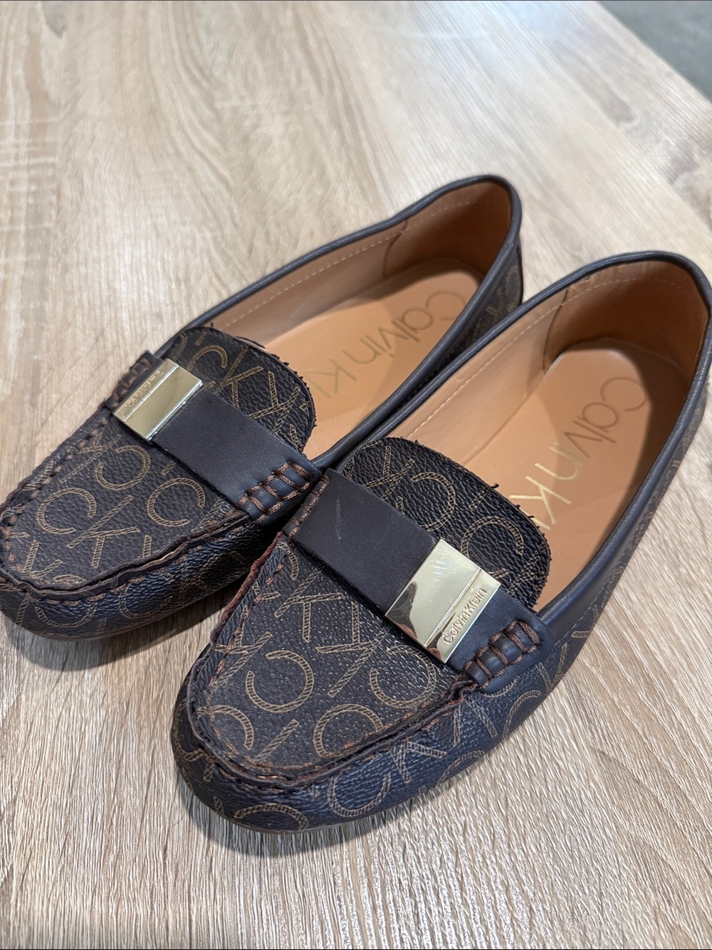 Calvin Klein Dark Brown Monogram Slip-On Loafers with Gold Accent